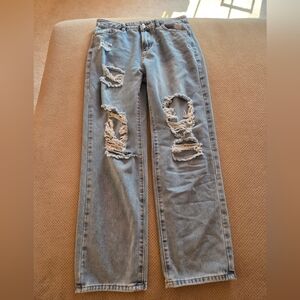 Women's large high rise distressed blue jeans. Women's 8-10